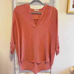 Rose colored blouse